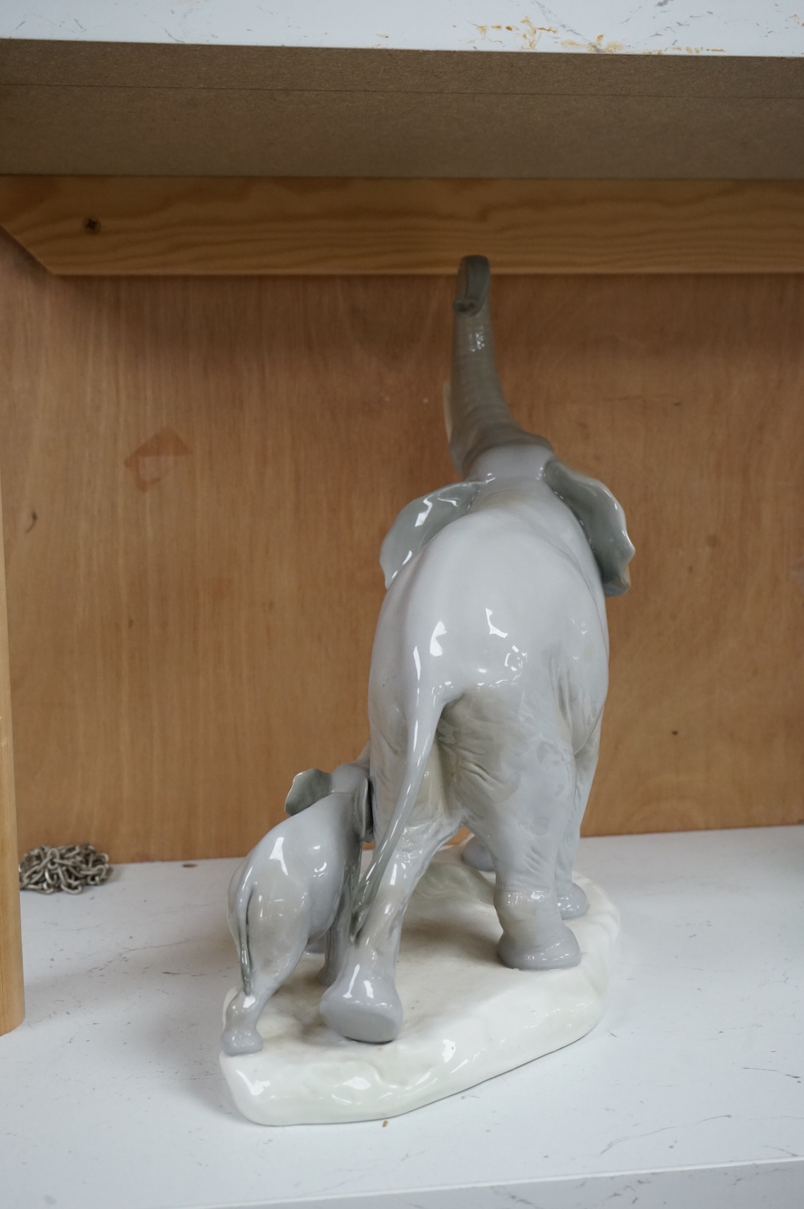 A Lladro elephant and calf figure group, 30cm high